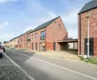 Huis in Maaseik, moderne nieuwbouw met rode steen en zadeldak met 3 slaapkamers