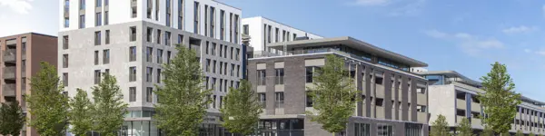 Bâtiments élégants et modernes à Quartier Bleu, Hasselt, mettant en valeur un design contemporain.