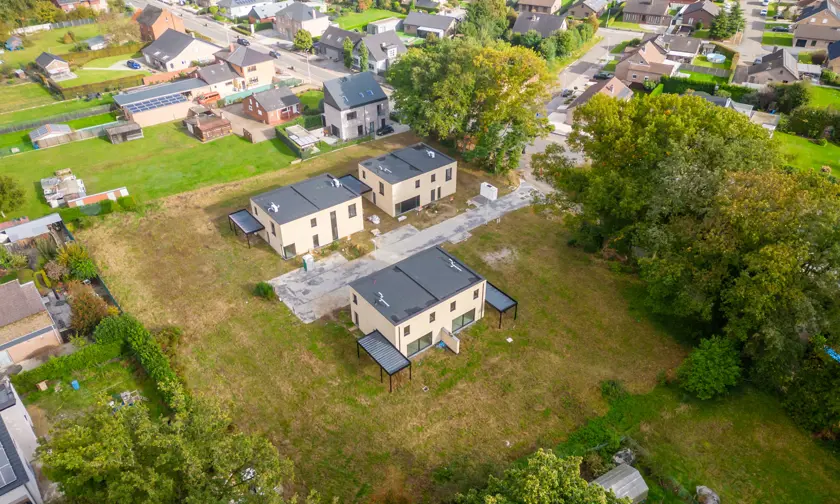bouwgrond Houthalen tenrijt omgeven door groen in een kleine verkaveling